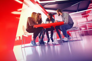 drewdoesmarketing_a_group_of_modern_employees_sitting_together__257be9f6-a96e-4715-8aac-2629ec5013fc