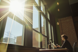 drewdoesmarketing_a_person_performing_a_job_interview_in_a_sunn_5d073697-501a-4568-afc3-09d265b92d89
